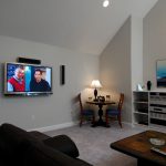 Media Room with wall mounted TV and surround sound