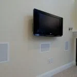 Wall mounted TV with in wall speakers